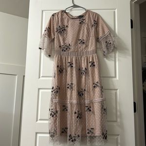 Beautiful light pink dress with embroidered flowers.